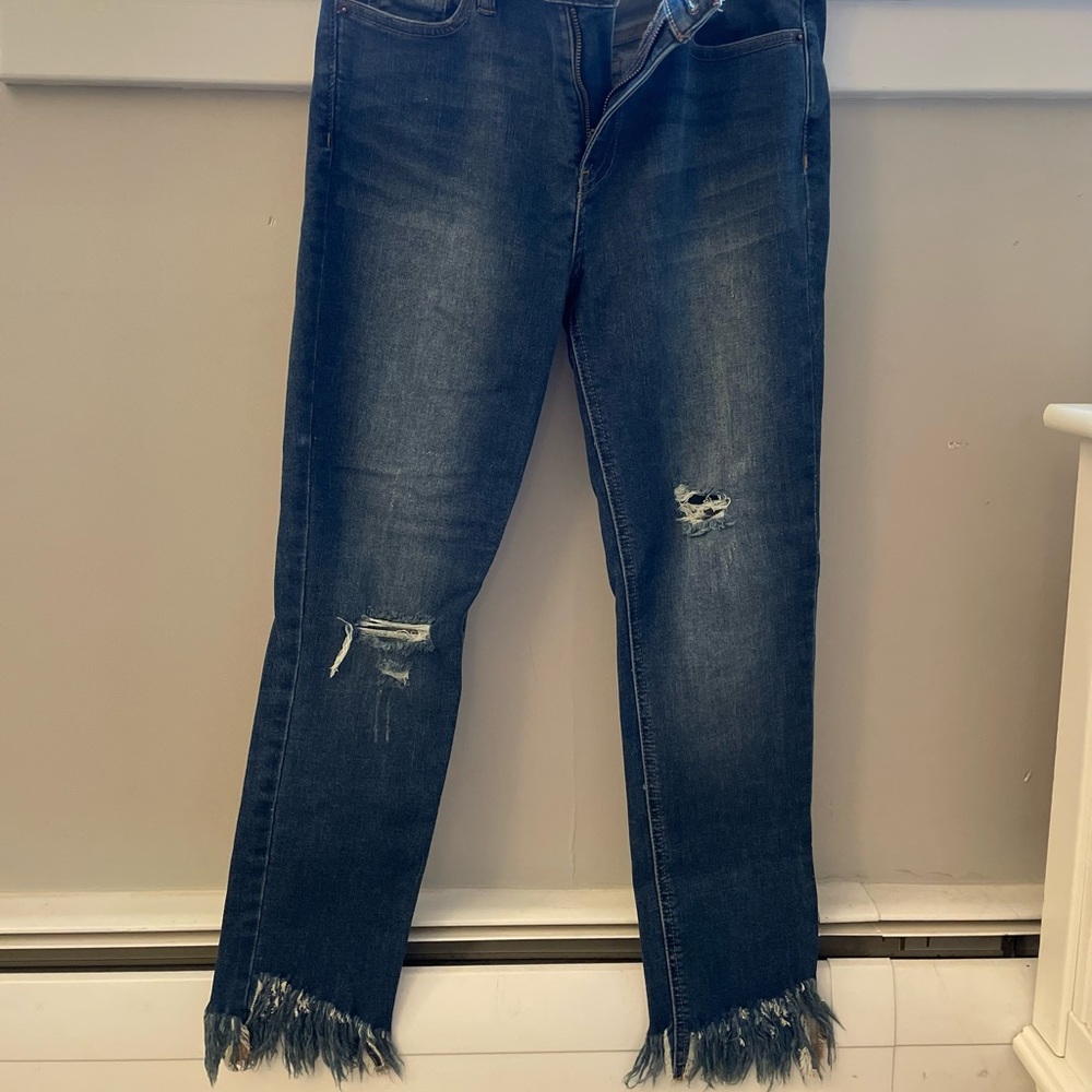 Free people distressed dark blue jeans